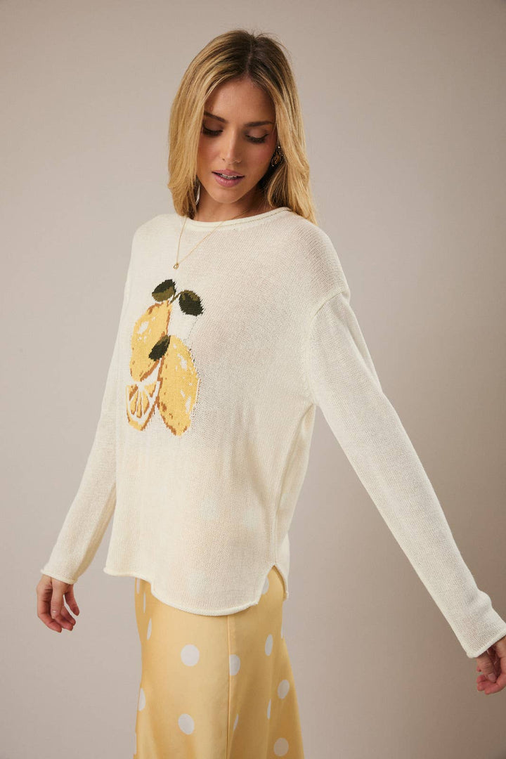 ROUND ROLL UP NECK LEMON GRAPHIC SWEATER: CREAM