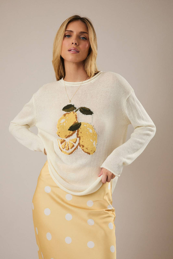 ROUND ROLL UP NECK LEMON GRAPHIC SWEATER: CREAM