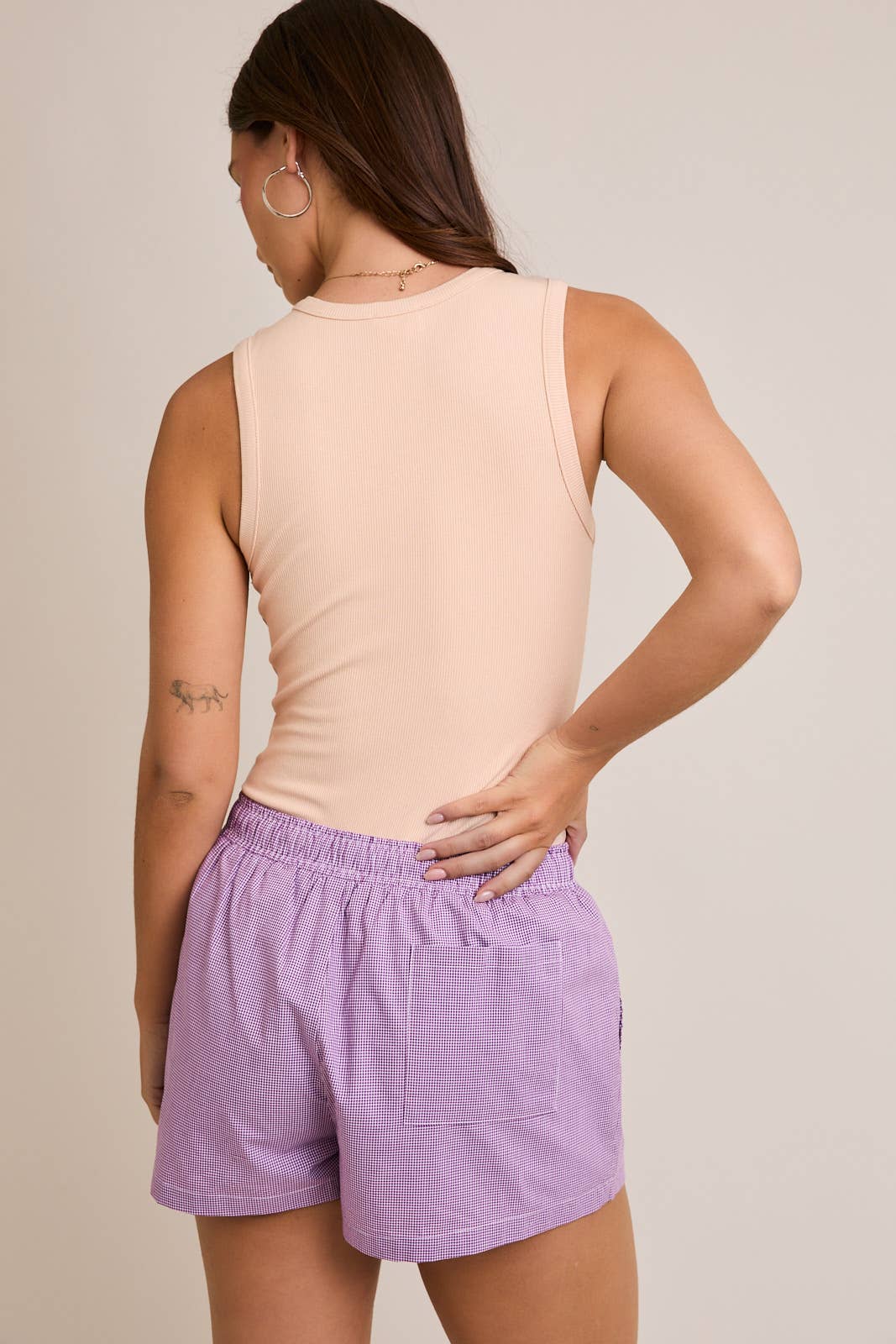 ROUND NECK SLEEVELESS BODYSUIT: Taupe